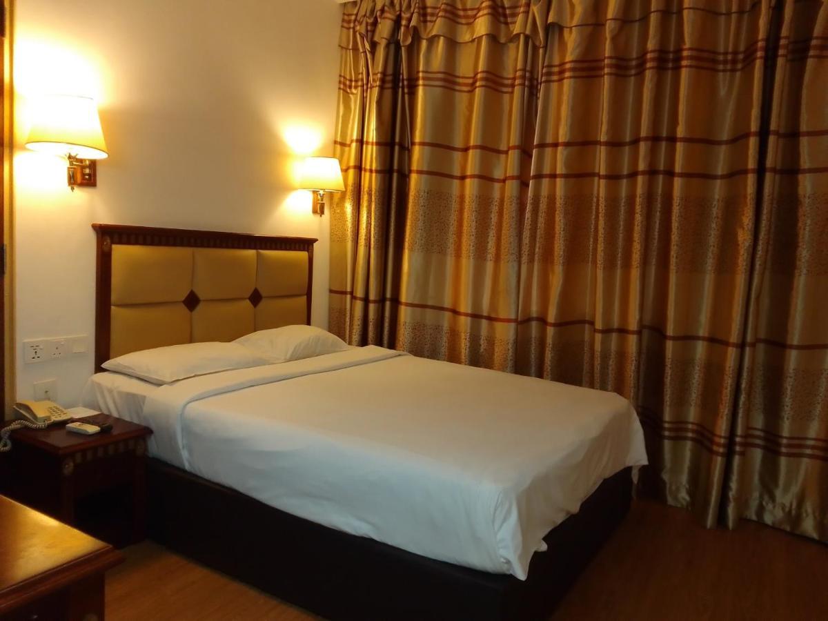 קוטה קינבלו Super Oyo 90464 Borneo Suites Hotel מראה חיצוני תמונה